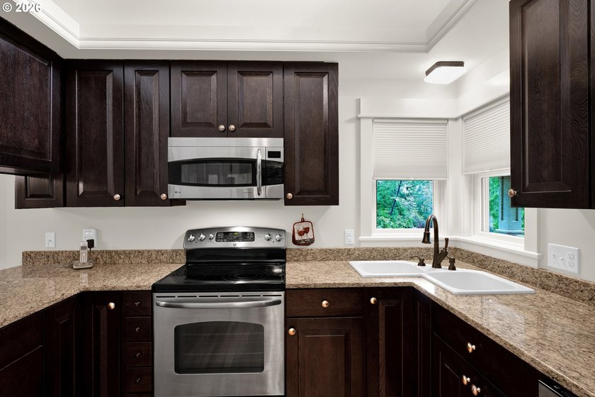 First time on the market, this custom-built retreat offers your - photo 9