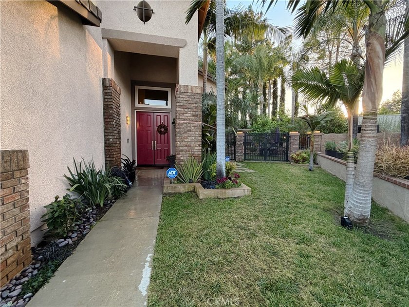 Welcome to this elegant two-story residence in the prestigious - photo 3