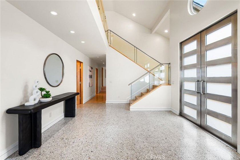 Experience the epitome of luxury beachfront living at 1554 E - photo 2