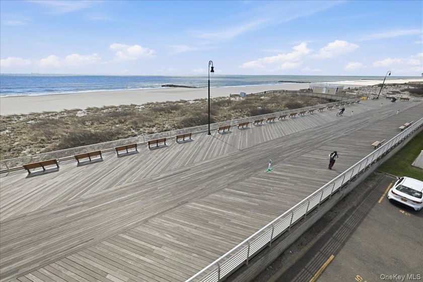 Enjoy breathtaking beachfront living in this beautiful - photo 11