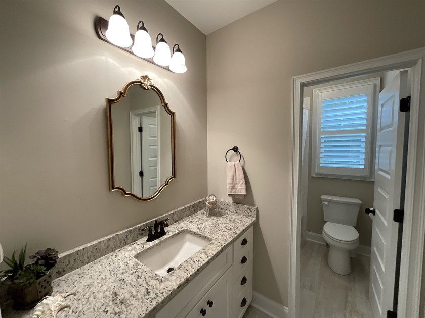 This classically designed home exudes charm and beauty - photo 37