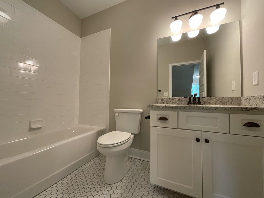 This classically designed home exudes charm and beauty - photo 45