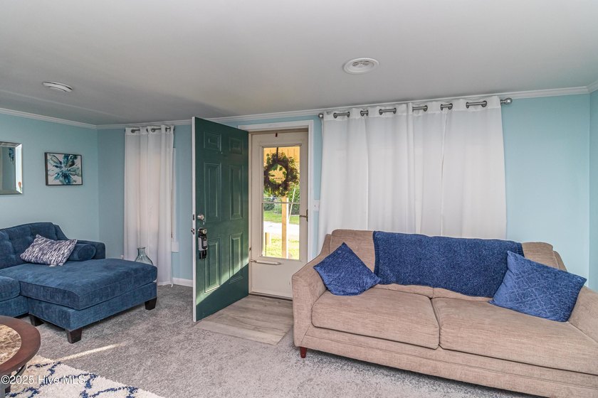 This charming 2-bedroom, 1-bath home blends modern updates with - photo 2