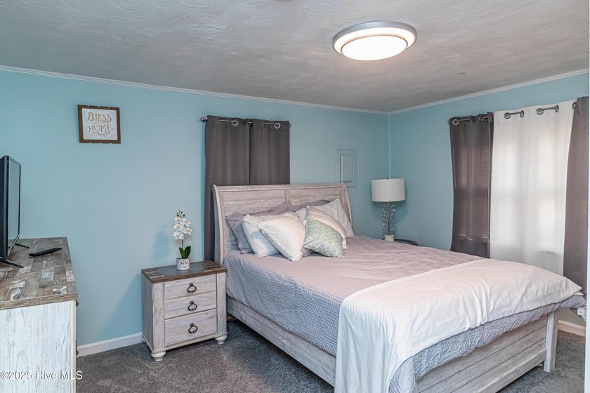 This charming 2-bedroom, 1-bath home blends modern updates with - photo 8