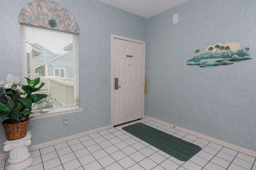 This three-bedroom, three-bath residence is priced to sell and - photo 2