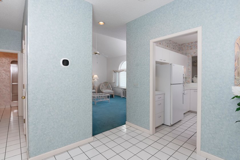This three-bedroom, three-bath residence is priced to sell and - photo 3