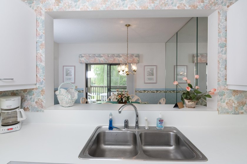 This three-bedroom, three-bath residence is priced to sell and - photo 7