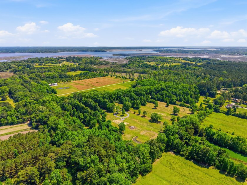 Welcome to this expansive 12.25-acre property in the heart of - photo 7