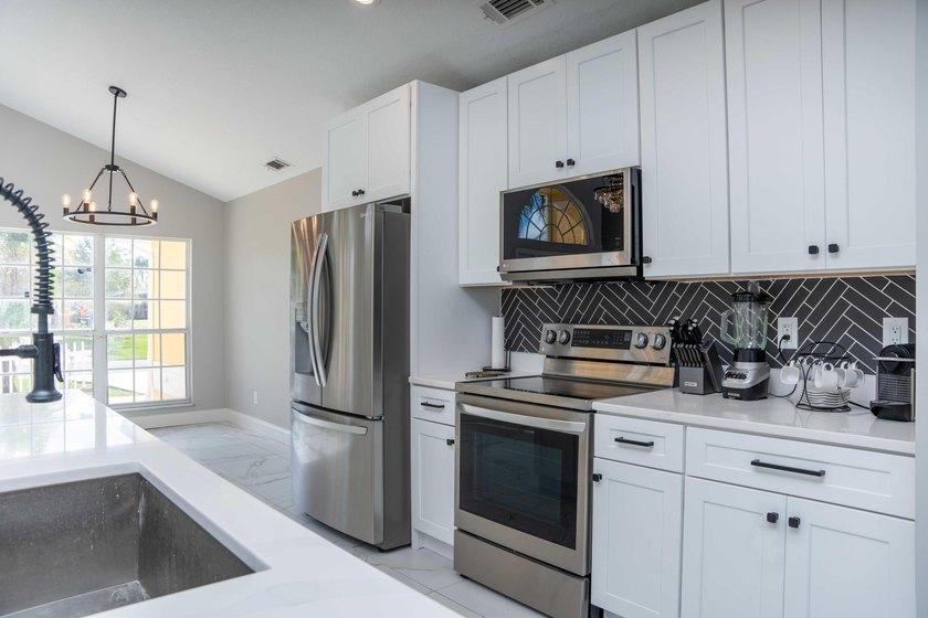 Discover this amazing home Pool home featuring 3 bedrooms, 2 - photo 6