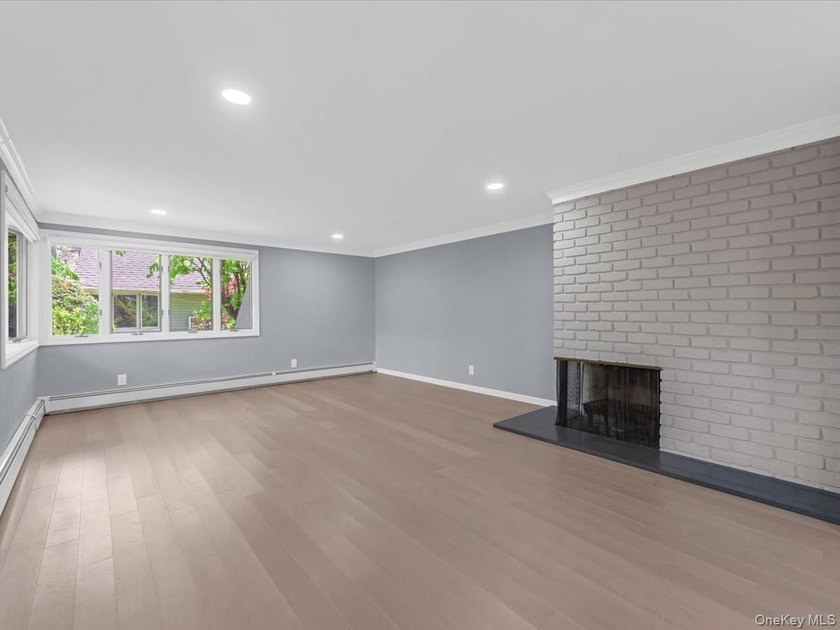 Welcome to this fully renovated ranch-style residence in the - photo 4
