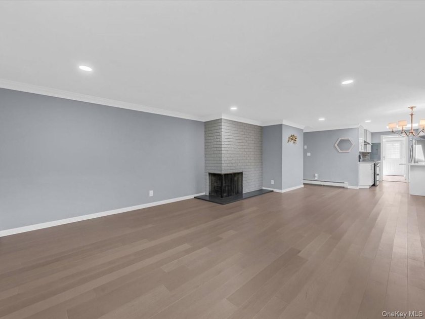 Welcome to this fully renovated ranch-style residence in the - photo 5