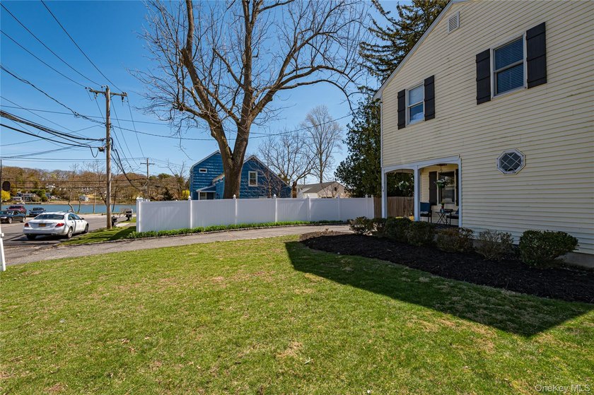 Stunning water views! This 4 bedroom, 2 full bath Colonial is - photo 6