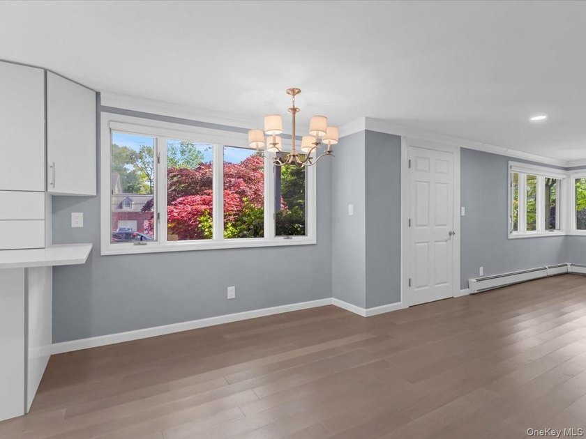 Welcome to this fully renovated ranch-style residence in the - photo 8