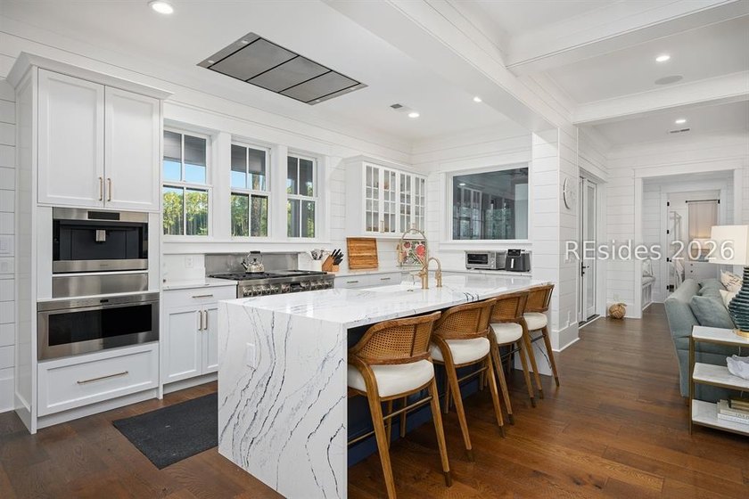 Gracefully positioned on a half-acre homesite overlooking one of - photo 12