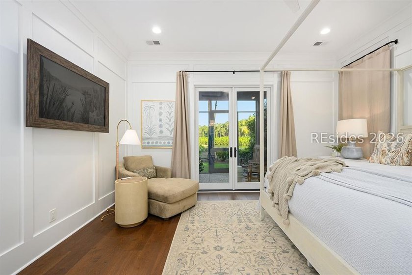 Gracefully positioned on a half-acre homesite overlooking one of - photo 17