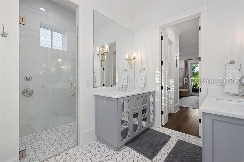 Gracefully positioned on a half-acre homesite overlooking one of - photo 19