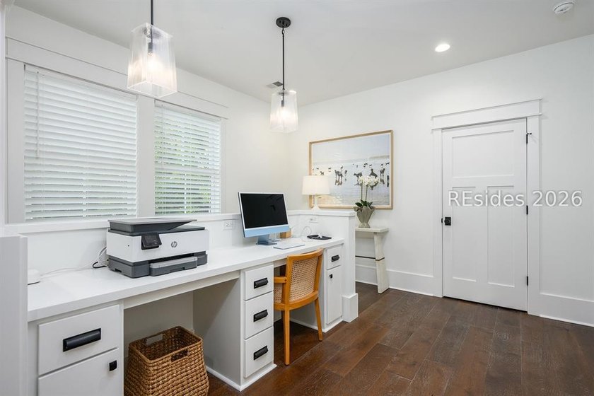 Gracefully positioned on a half-acre homesite overlooking one of - photo 22