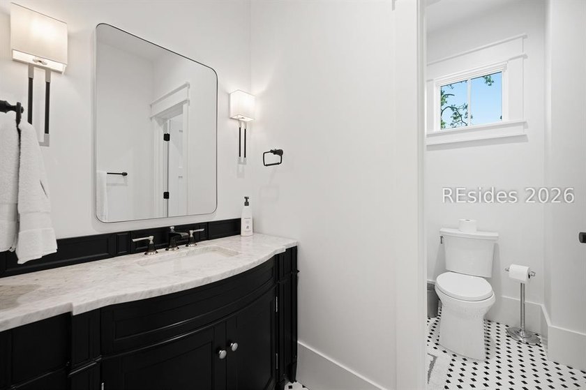Gracefully positioned on a half-acre homesite overlooking one of - photo 25