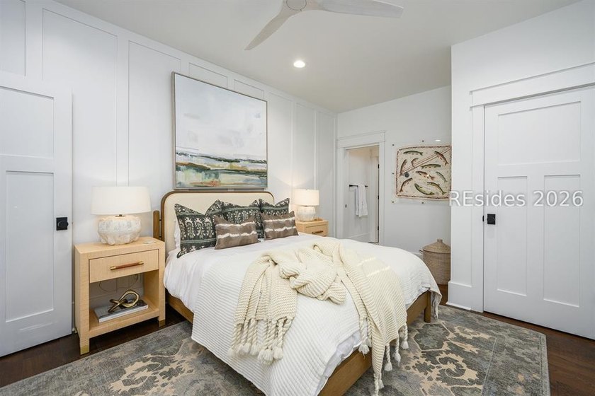 Gracefully positioned on a half-acre homesite overlooking one of - photo 27