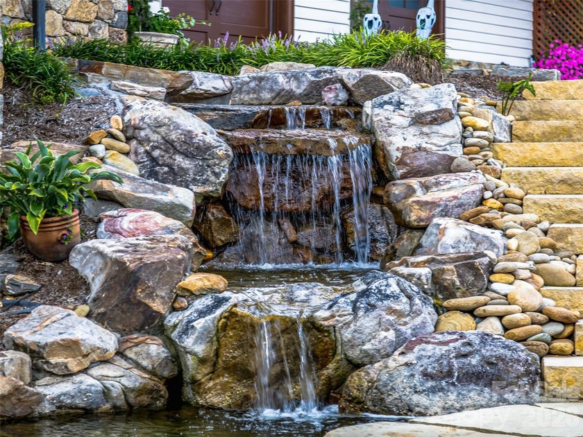Set across 105.65 acres of pristine mountain landscape, this - photo 34