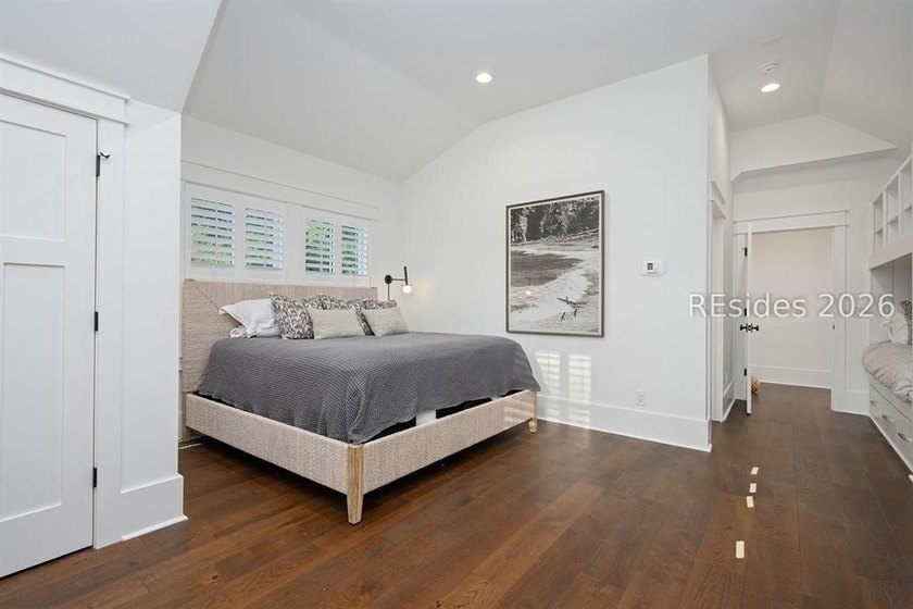 Gracefully positioned on a half-acre homesite overlooking one of - photo 34
