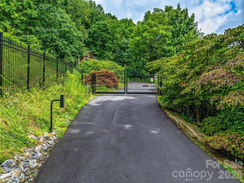 Set across 105.65 acres of pristine mountain landscape, this - photo 37