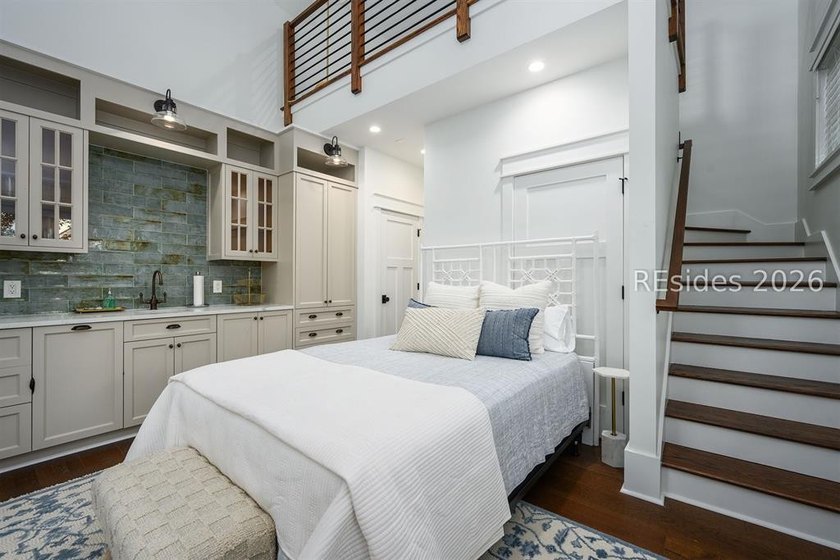 Gracefully positioned on a half-acre homesite overlooking one of - photo 39