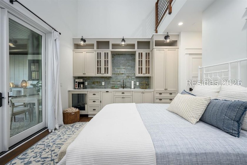 Gracefully positioned on a half-acre homesite overlooking one of - photo 40