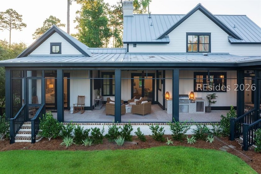 Gracefully positioned on a half-acre homesite overlooking one of - photo 46