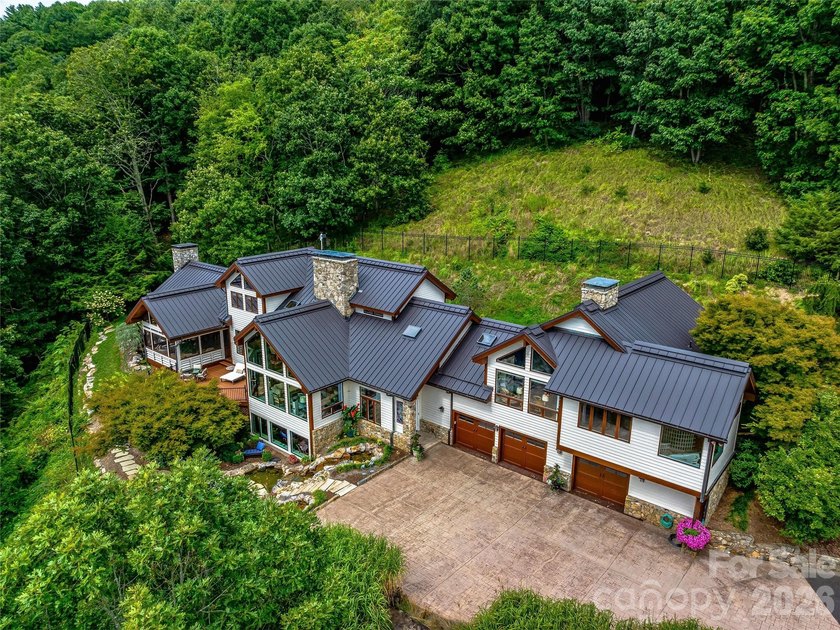 Set across 105.65 acres of pristine mountain landscape, this - photo 48