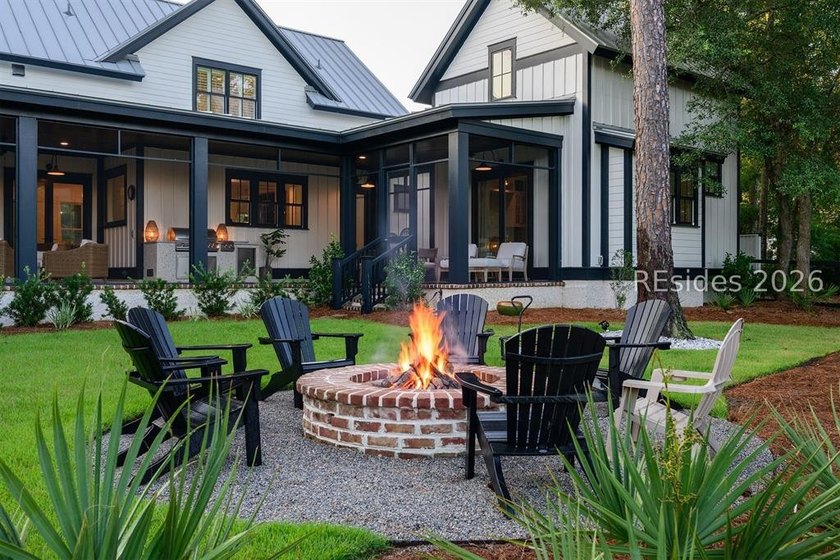Gracefully positioned on a half-acre homesite overlooking one of - photo 49