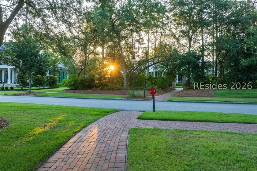 Gracefully positioned on a half-acre homesite overlooking one of - photo 50