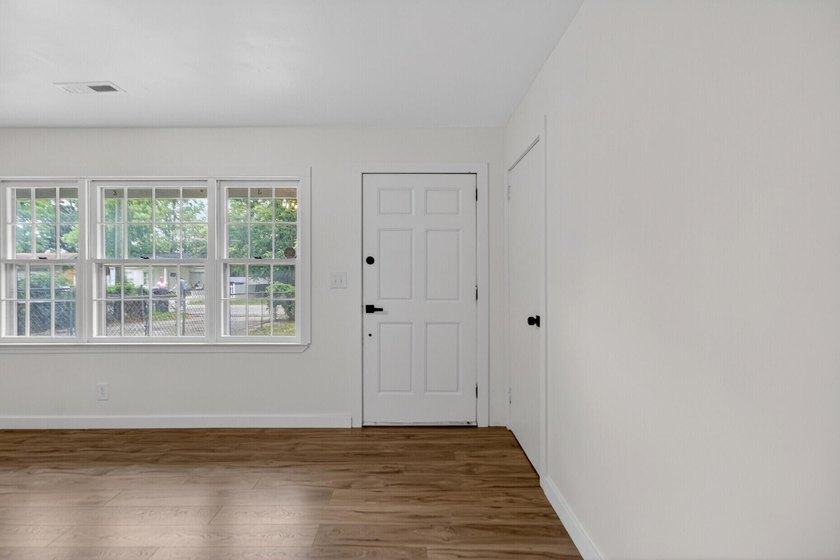 NEWLY REMODELED HOME WITH TWO GARAGES!Welcome to this charming - photo 5