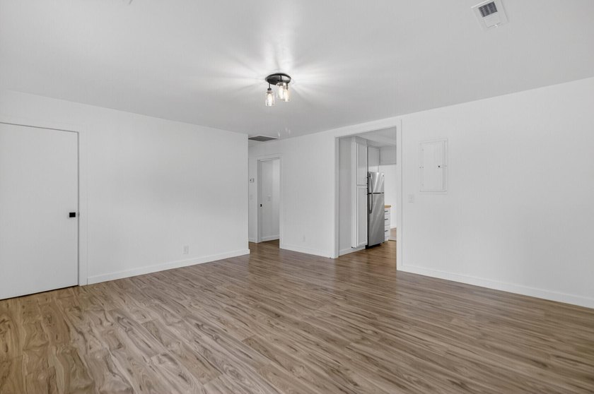 NEWLY REMODELED HOME WITH TWO GARAGES!Welcome to this charming - photo 7