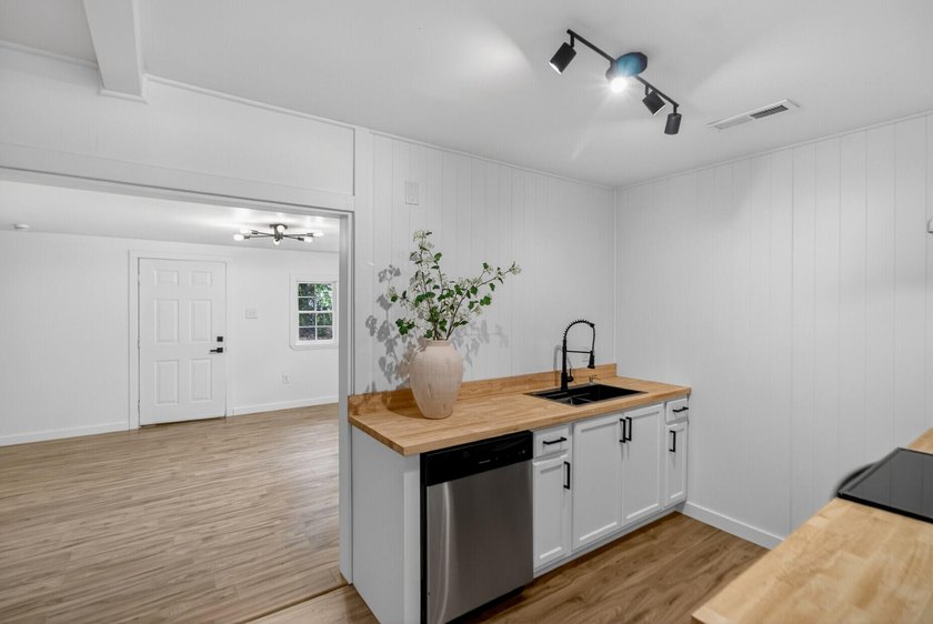 NEWLY REMODELED HOME WITH TWO GARAGES!Welcome to this charming - photo 9