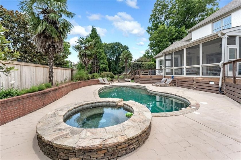 Nestled on a private cul-de-sac within the prestigious gates of - photo 35