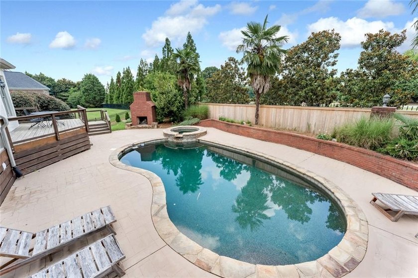 Nestled on a private cul-de-sac within the prestigious gates of - photo 36