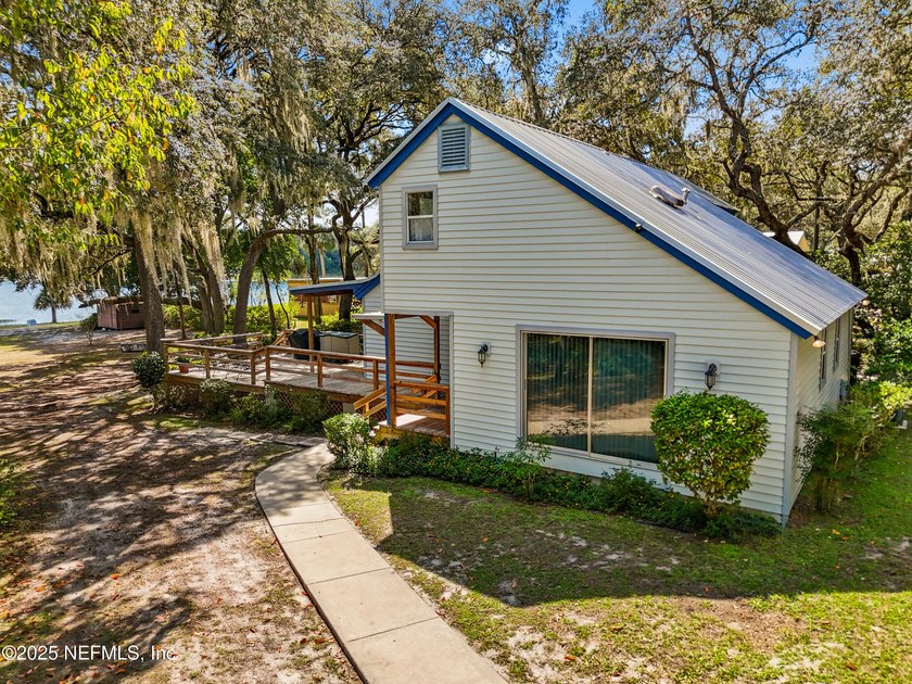 This immaculate and well loved lake home with additional cottage - photo 2