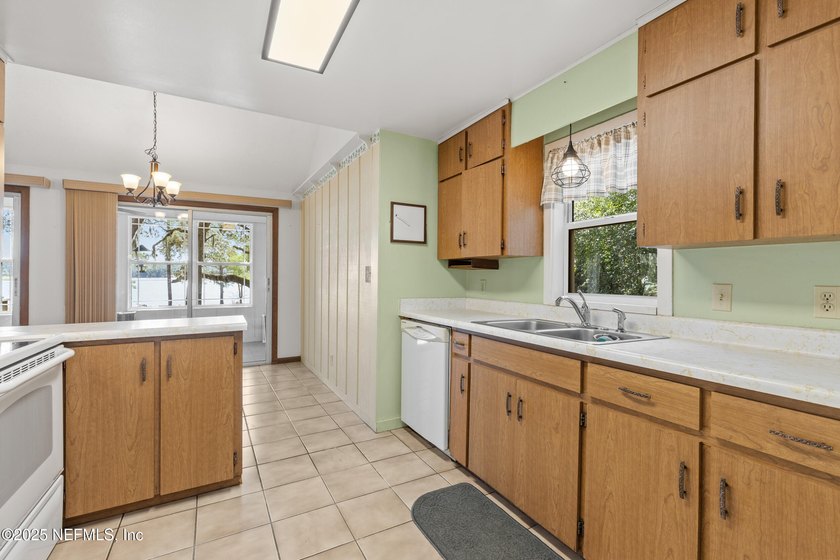 This immaculate and well loved lake home with additional cottage - photo 8