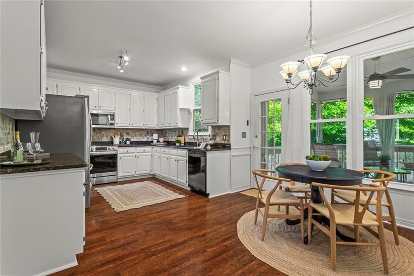 Over $150,000 in Seller Upgrades, on a stocked pond, in West - photo 11