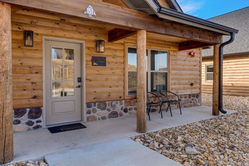 Welcome to 151 Summer Bay Blvd, where rustic Ozark charm meets - photo 3