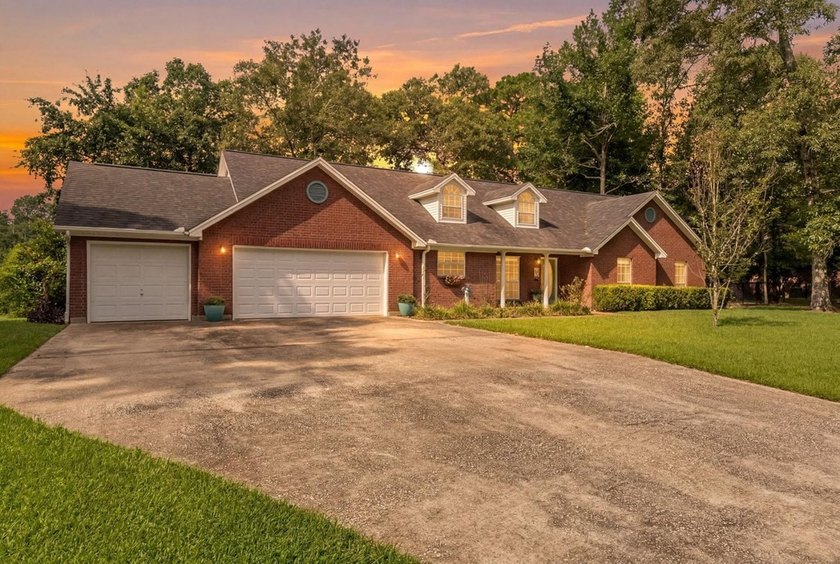 Experience luxury lakeside living in this custom built brick - photo 2