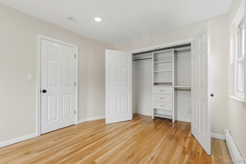 Welcome home to this beautifully renovated top-floor, walkup - photo 21