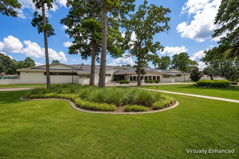Nestled on a picturesque golf course lot, this exceptional - photo 3