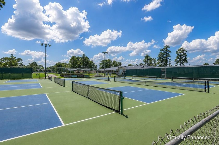 Nestled on a picturesque golf course lot, this exceptional - photo 4