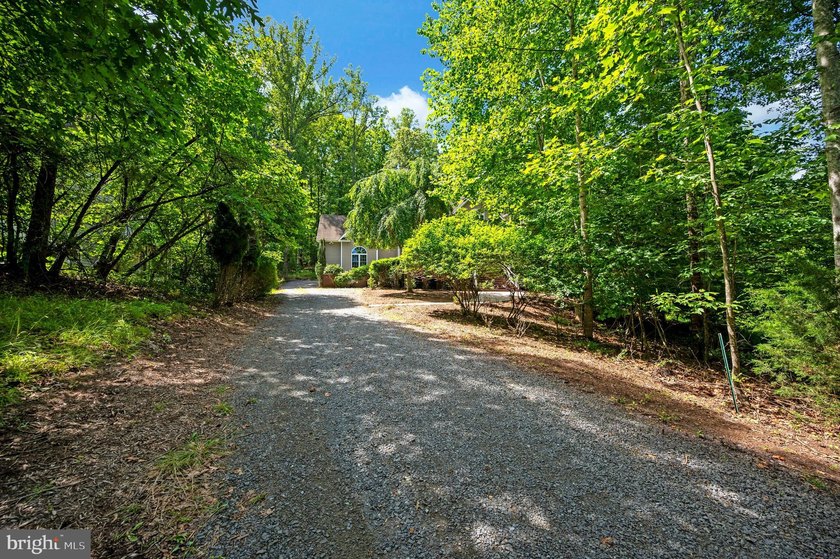 Imagine starting your day on the expansive covered front porch - photo 2