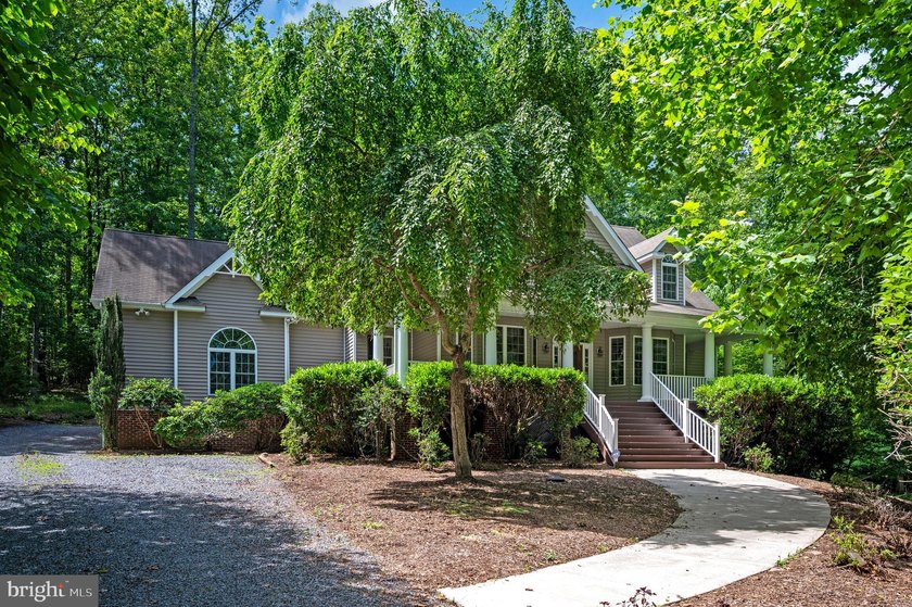 Imagine starting your day on the expansive covered front porch - photo 3