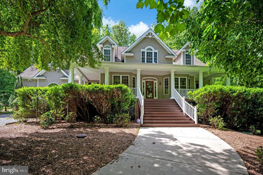 Imagine starting your day on the expansive covered front porch - photo 5