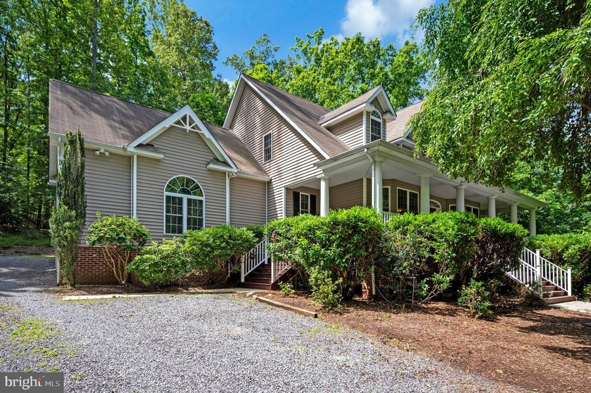 Imagine starting your day on the expansive covered front porch - photo 6