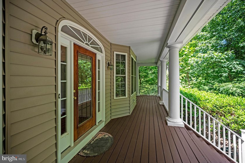 Imagine starting your day on the expansive covered front porch - photo 7